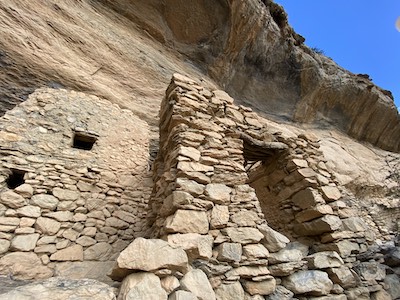 village sheltered under protruding rock jebel shams
